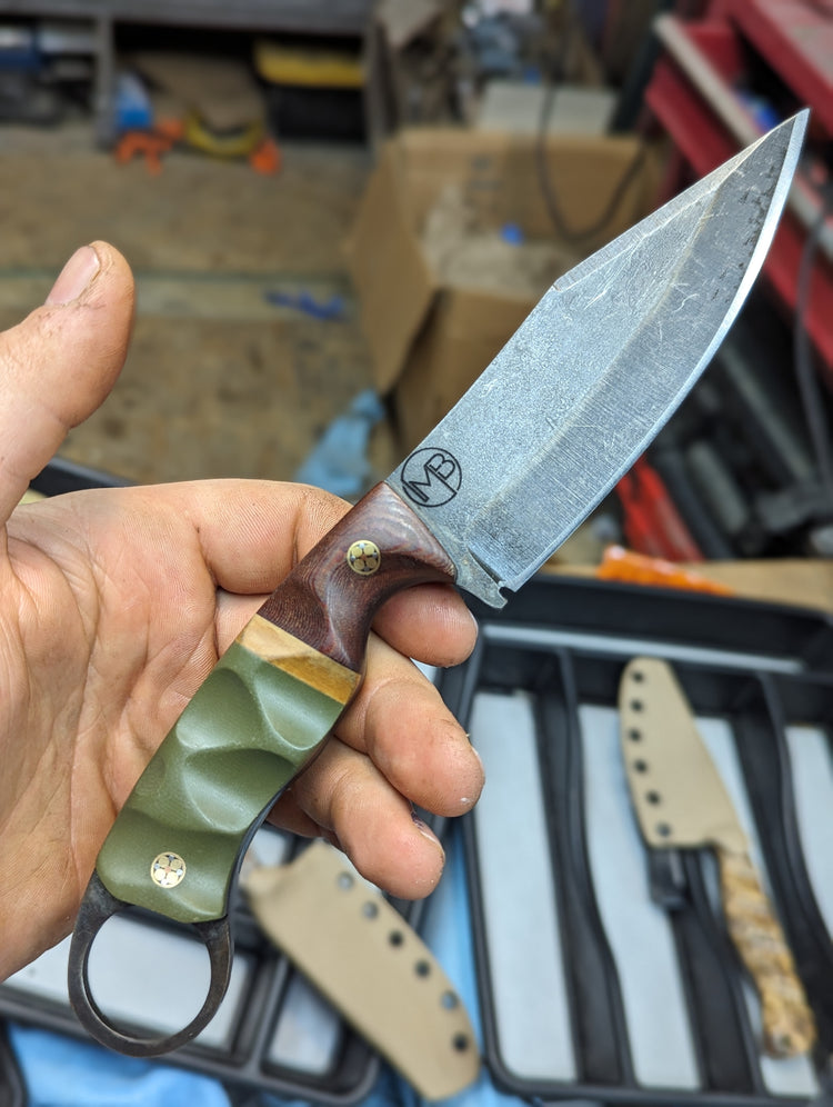 Northern Concept, Cross-aged micarta bolsters, paper micarta, OD green G10, Mosaic pins